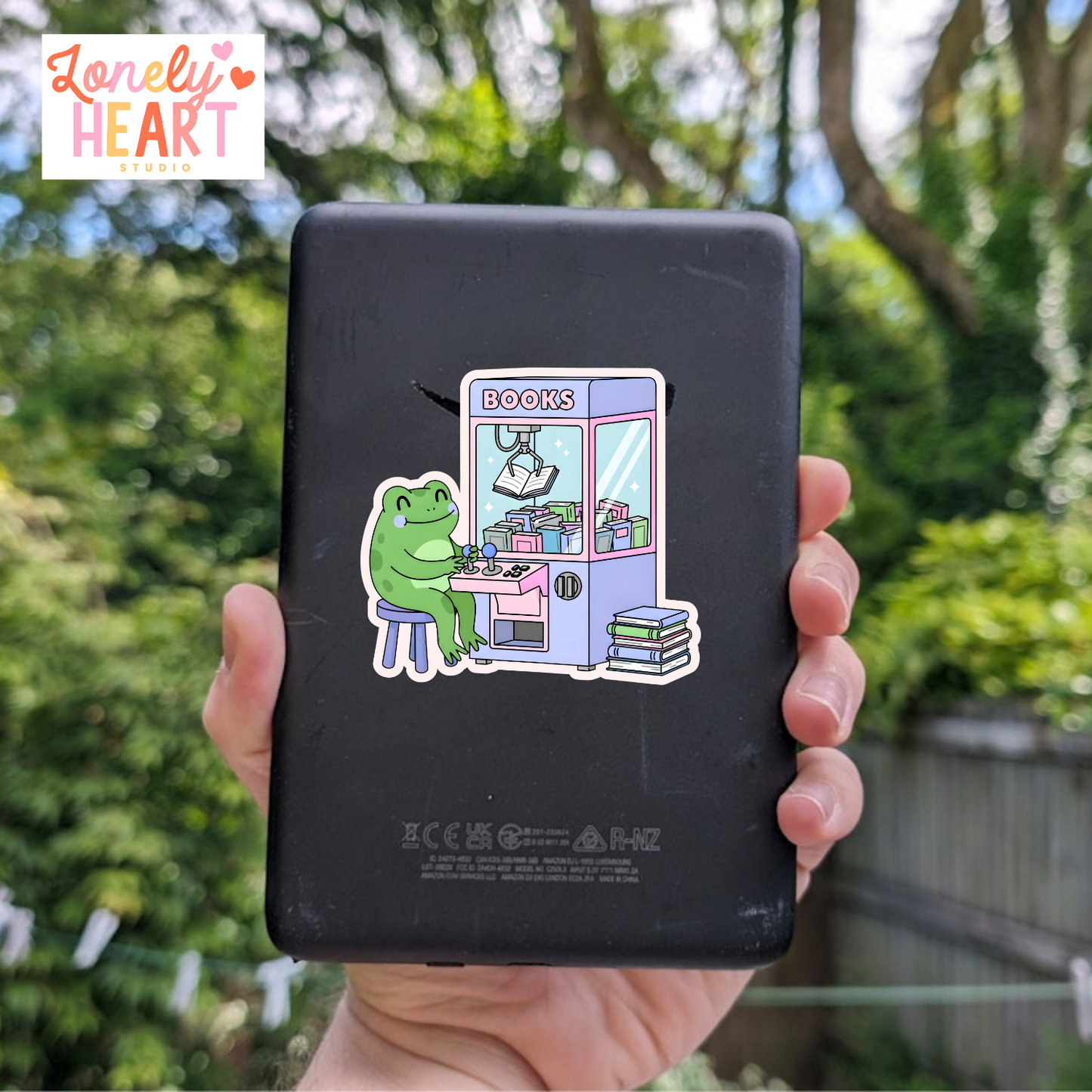 Bookish Claw Arcade Machine Vinyl Sticker – Cute Aesthetic 💜